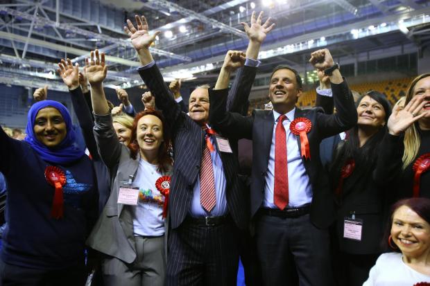 Anas Sarwar celebrates the election results at the count in Glasgow - where his party narrowly failed to win. Photo: Colin Mearns