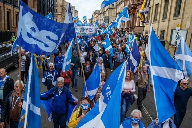 All Under One Banner march for independence, Defend Our NHS march,  Glasgow. Marchers on West George Street...Photograph by Colin Mearns.14 May 2022..