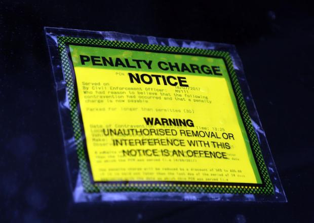 The National: Private parking companies have been accused of being overly aggressive in their pursuit of fees (PA)