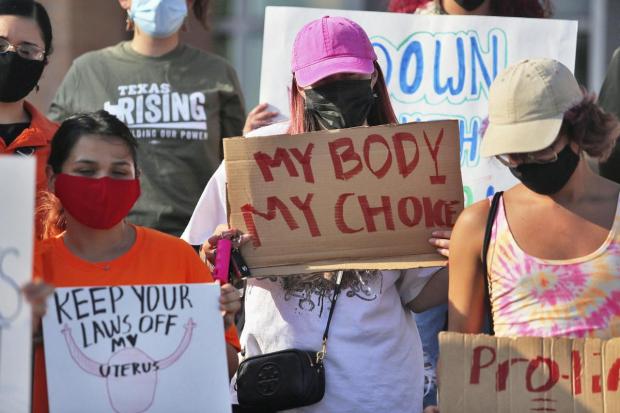 Protesters march against anti-abortion legislation
