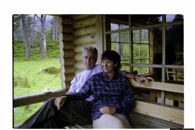 Ghislaine Maxwell sits outside a cabin with Jeffrey Epstein