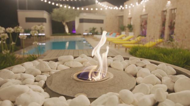 The National: The firepit at the Casa Amor villa. Love Island continues tomorrow at 9pm on ITV2 and ITV Hub. Episodes are available the following morning on BritBox (ITV)