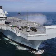 The Royal Navy flagship was set to depart on Sunday evening
