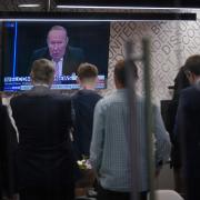 Staff in the green room watching a television screen showing presenter Andrew Neil broadcast from a studio, during the launch event for new TV channel GB News at The Point in Paddington, London. Picture date: Sunday June 13, 2021. PA Photo. See PA story