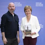 First Minister Nicola Sturgeon with Douglas Stuart before attending the Edinburgh International Book Festival to discuss his bestselling novel Shuggie Bain