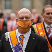 Members of the County Grand Orange Lodge take part in the annual Orange walk parade through the city centre of Glasgow