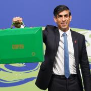 Rishi Sunak holds his Green Box at the Cop26 summit at the SEC in Glasgow