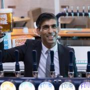 Rishi Sunak has been criticised for leaving the UK amid a crisis in the hospitality sector