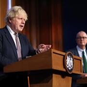 Boris Johnson's government has rejected calls for a 'tougher four-nations' approach to the Omicron variant of coronavirus