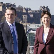 Ruth Davidson (right) said in 2018 that 'almost all' Scottish Tory candidates would have benefited from the dark money Scottish Unionist Association Trust, which has also donated to Douglas Ross
