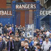 Fans leave Ibrox after the game