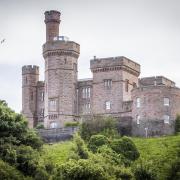 The spectacular red sandstone castle was built as a court and prison in the 19th century