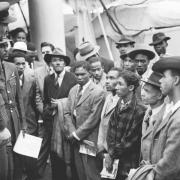 File photo dated 22/06/48 of Jamaican immigrants welcomed by RAF officials after ex-troopship HMT Empire Windrush landed them at Tilbury