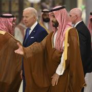 US President Joe Biden and Saudi Crown Prince Mohammed bin Salman arriveat a hotel in Saudi Arabia's Red Sea coastal city of Jeddah