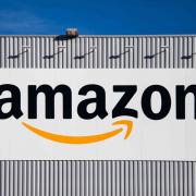 Amazon workers walk out of major warehouse in pay and conditions dispute