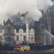 Firefighters tackle the blaze during a fire at Cameron House in 2017
