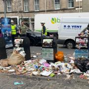 The streets of Edinburgh are strewn with rubbish amid the ongoing strikes