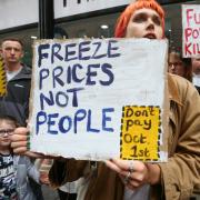 Demonstrators gathered outside the Ofgem building in Glasgow after the regulator announced energy prices will rise by 80%