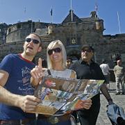 File photograph of tourists at Edinburgh Castle