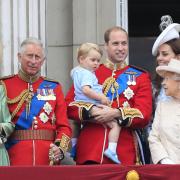 Camilla, Queen Consort, King Charles, Prince George, Prince William and Kate Middleton, Queen Elizabeth, and Prince Harry on the balcony at Buckingham Palace in 2015