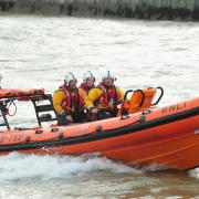 Four people had to be rescued by the RNLI near Moray