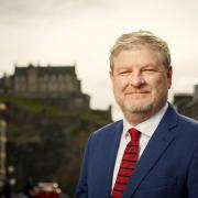 Unionists have fumed over Angus Robertson's trips to promote Scotland internationally
