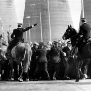Miners strike 1984. Police horses move in on pickets as coal lorries enter Ravenscraig
