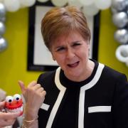 First Minister Nicola Sturgeon with comedy teeth during her visit to Buchanan Street Residential Children's Home in Coatbridge