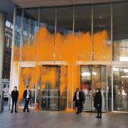 The News Corp building was splattered with orange paint