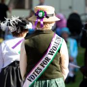 The purple, white and green colours were used by women's rights campaigners in the early 20th century