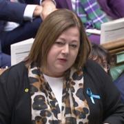 Kirsten Oswald was seen wearing a blue ribbon at PMQs