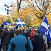 The  Rassemblement pour un Pays Souverain held up Scottish flags at a commemoration of the Patriots War