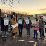 Teachers from the Scottish Secondary Teachers' Association union (SSTA) on the picket line at Smithycroft Secondary School in Glasgow