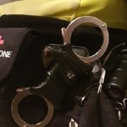 A Police Scotland officer carrying a Naloxone kit on their belt
