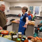 King Charles (left) during his visit to Aboyne and Mid Deeside Community Shed in Aboyne, Aberdeenshire today