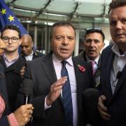 'Bad boy of Brexit' Arron Banks (centre) was accused of bringing a SLAPP against journalist Carole Cadwalladr