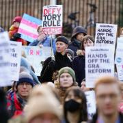 Campaingers picket the UK Government Office at Queen Elizabeth House in Edinburgh after Westminster blocked the Gender Recognition Reform (Scotland) Bill from receiving Royal Assent
