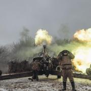Ukrainian soldiers work in their artillery unit in the direction of Marinka, January 2023