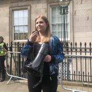 Gillian Mackay giving a speech at a reproductive rights rally outside the US Consulate in Edinburgh