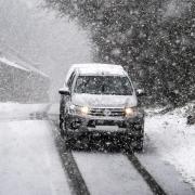 Snow, rain and wind is bringing disruption to roads across the country