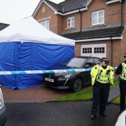 Officers outside Nicola Sturgeon's house while they were searching her house