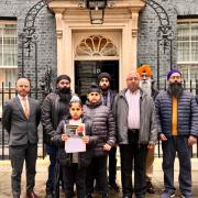 The family of Jagtar Singh Johal outside Downing Street