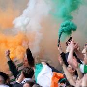 Celtic fans celebrate after beating Rangers 1-0