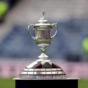 The Scottish Cup trophy on display at a semi-final match at Hampden Park