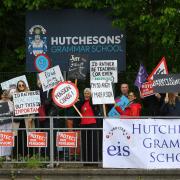 Teachers at Hutchesons' Grammar have gone on strike over changes to their pension scheme