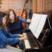 The Scottish Government has kept its promise on music tuition, say educators