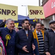 The SNP is facing its first electoral test under the leadership of Humza Yousaf (centre) as Joseph Budd (centre left) bids to win a council seat in North Lanarkshire