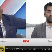 Sky News host Trevor Phillips and SNP First Minister Humza Yousaf (right)
