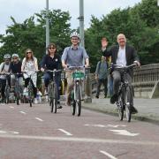 Green minister Patrick Harvie cycles with others on the South City Way in Glasgow