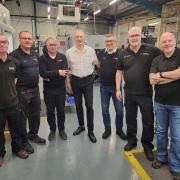 The Martin Precision employees who have been with the firm since it opened in 1993, from left: Steven McKay, Martin McKay, Tom Morrison, William Martin, Dougie Smith, Stuart Thomson, and Alan McLellan
